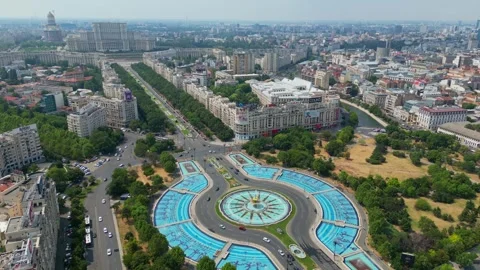 BUCHAREST, ROMANIA - August 15, 2024 Unirii Square Fountains Aerial Drone View Stock-Footage 346253901