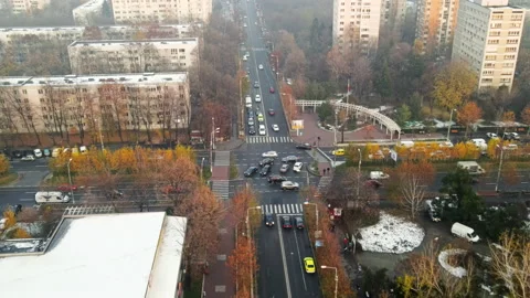 BUCHAREST, ROMANIA - DECEMBER 9, 2020: Crossroad with moving cars, people Stock Footage 145173033