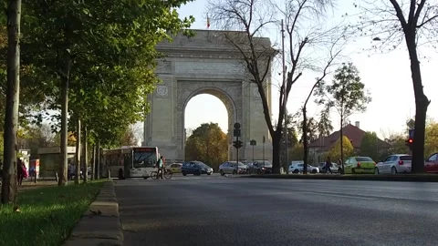 BUCHAREST, ROMANIA - MAY 18, 2018: A street view of the Arch of Triumph. Stock Footage 320949460
