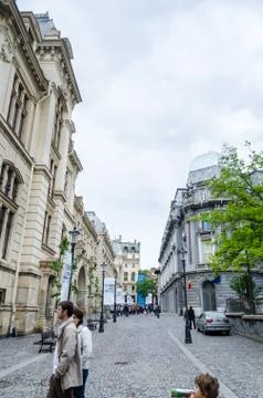 BUCHAREST, ROMANIA - MAY 25, 2014: The streets with old, vintage buildings fr Stock Photos