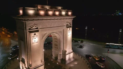 BUCHAREST, ROMANIA - September 15, 2026 Aerial Night View Of Arch Of Triumph Vídeos de archivo 346650954
