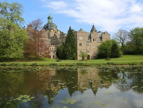 Buckenburg palace with reflections 스톡 사진