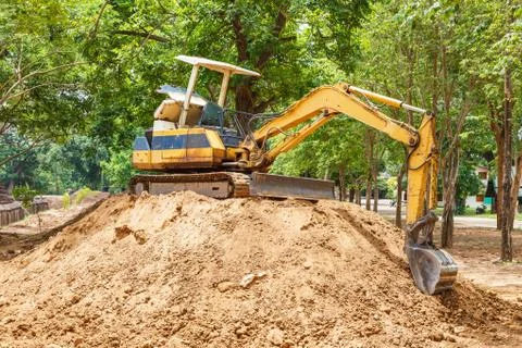 Bucket backhoe with tractor Stock Photos