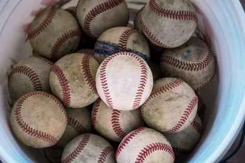 A bucket of baseballs Stock Photos