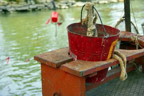 Bucket on bench Stock Photos