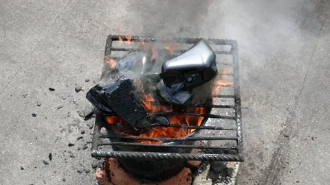 Bucket boiling tar resin on bricks. bitumen melted, bucket, burner, fire Stock Footage 132082906