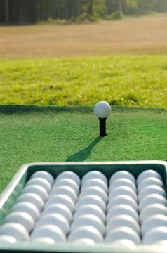 Bucket golf balls Stock Photos