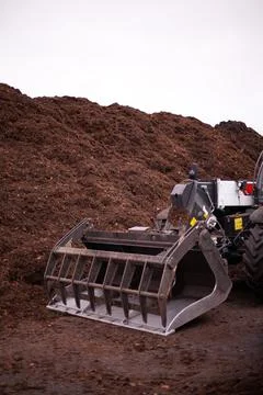Bucket with grab of tractor 스톡 사진