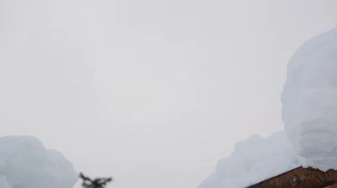 Bucket loader dumping snow Stock Footage 52878906