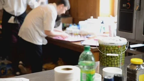 Bucket of olives is on the table Stock Footage 81543476