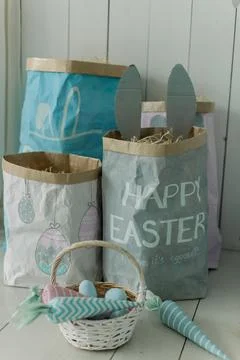 Bucket with painted eggs for Easter basket background for the holiday Stock Photos