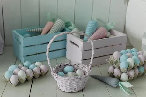 Bucket with painted eggs for Easter basket background for the holiday Stock Photos
