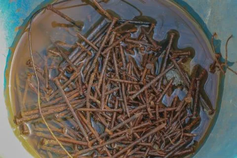 Bucket of rusty nails 写真素材