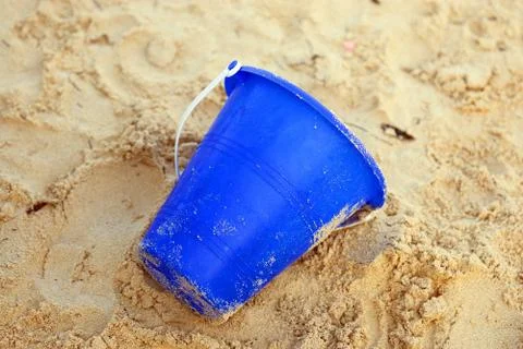 Bucket in Sand Stock Photos