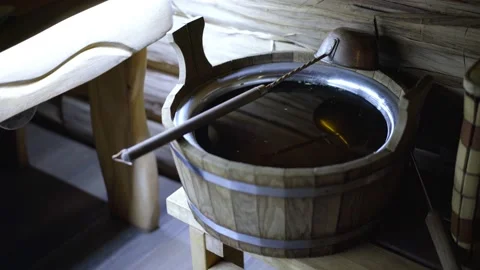 The bucket in the sauna is filled with water. interior in the sauna Stock Footage 239662931