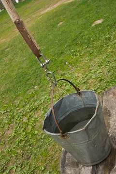 Bucket on well Stock Photos