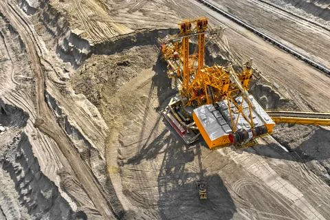 Bucket-wheel excavator for surface mining in a lignite quarry, Heavy industry. Stock Photos