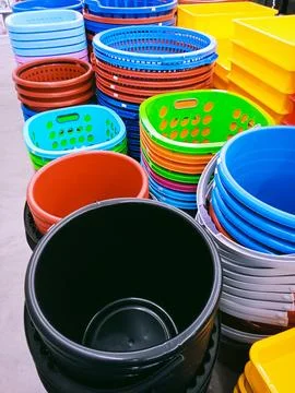 Buckets and colored baskets Stock Photos