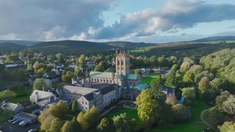 Buckfast Abbey from  a drone at evening sun, Totnes, Devon, England, Europe Stock-Footage 253758230