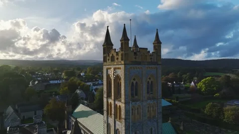 Buckfast Abbey from  a drone at evening sun, Totnes, Devon, England, Europe 動画素材 253758283
