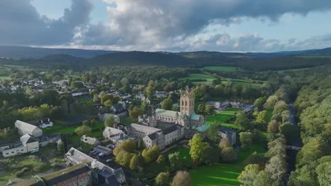 Buckfast Abbey from  a drone at evening sun, Totnes, Devon, England, Europe Stock-Footage 253758316