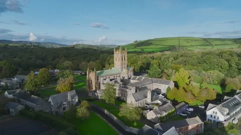 Buckfast Abbey from  a drone at evening sun, Totnes, Devon, England, Europe Stock-Footage 253758385