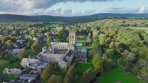 Buckfast Abbey from  a drone at evening sun, Totnes, Devon, England, Europe Stock-Footage 253758412