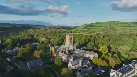 Buckfast Abbey from  a drone at evening sun, Totnes, Devon, England, Europe Stock-Footage 253758539