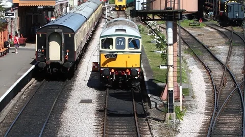 Buckfastleigh, Devon, England: Class 33 diesel engine leaves railway station Stock Footage 90460587