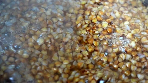 Buckwheat boiling in a pot. Stock Footage 170217452