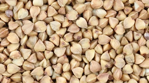 Buckwheat close up.  Front of the camera rotates plate with buckwheat Stock Footage 66307882