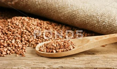 Buckwheat Groats And Wooden Spoon