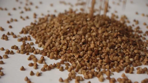 Buckwheat Poured On White Background Closeup Stock Footage 64951854