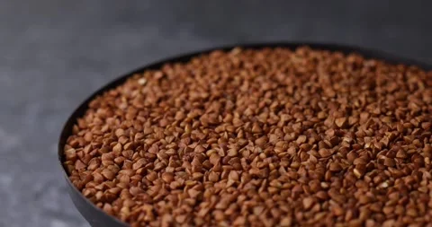 Buckwheat rotation macro loop with tilt shift shallow focus Video stock 320980433