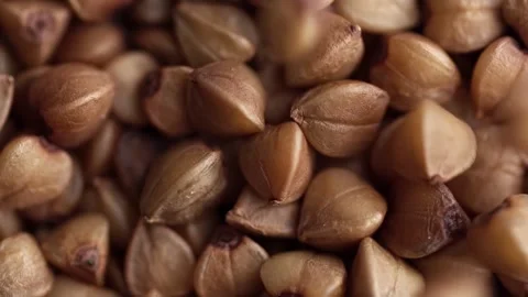 Buckwheat seeds pouring. Video stock 170621476