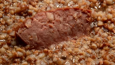 Buckwheat with sliced sausage Видео 312534295