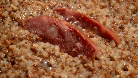 Buckwheat with sliced sausage Видео 312534328