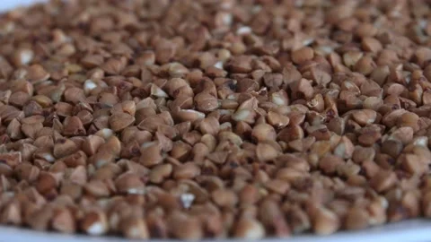 The buckwheat spins in a plate Stock Footage 136364894
