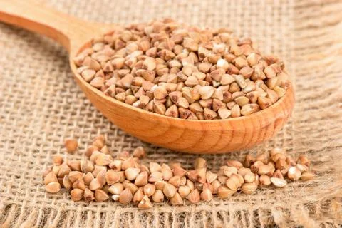 Buckwheat in spoonful Stock Photos