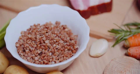 Buckwheat in White Bowl Stock Footage 304877427