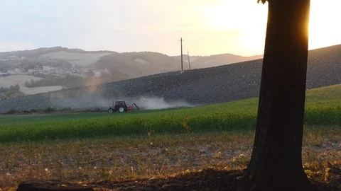 Bucolic scene of a tractor cutting the grass Video stock 116266662