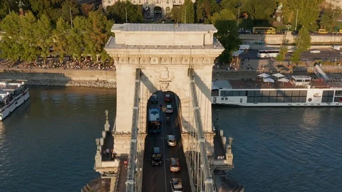 Budapest - 4K drone flying away from the stone pillar of Szechenyi Chain Bridge Stock Footage 115497953