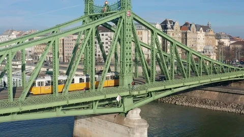 Budapest - 4K drone flying by famous Liberty Bridge &amp; yellow tram Stock Footage 121507393