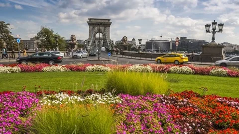 Budapest - Heavy traffic at Clark Adam Square with Szechenyi Chain Bridge Stock Footage 80571467