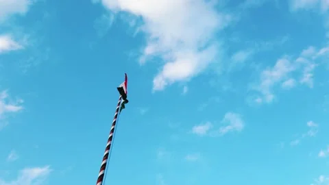 Budapest. Hungarian flag flutters in the wind on blue sky see from bottom. Stock Footage 150097034