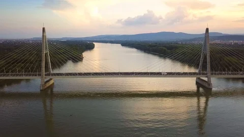 Budapest, Hungary - 4K hyperlapse flying above Megyeri Bridge at sunset Stock Footage 94856706