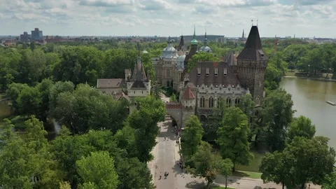 Budapest, Hungary - Drone flying towards Vajdahunyad Castle with blue sky Stock Footage 140168669