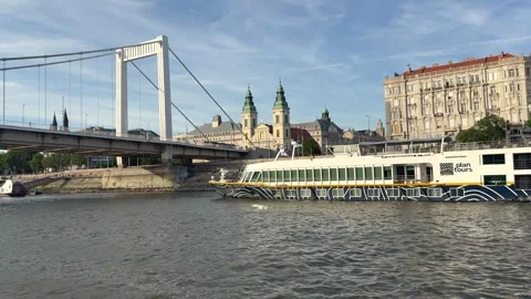 Budapest, Hungary - May 29, 2026: River cruise ship sailing on the Danube River  Stock Footage 338995975