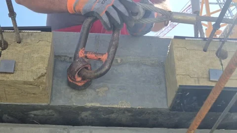 BUDAPEST, HUNGARY - MAY 6, 2026: Preparing Lifting Eye on Concrete Slab Stock-Footage 341801065