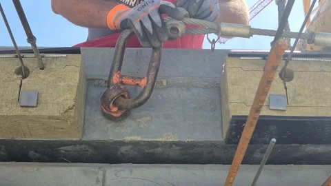 BUDAPEST, HUNGARY - MAY 6, 2026: Slow Motion Concrete Slab Lifting Eye Stock-Footage 341801090